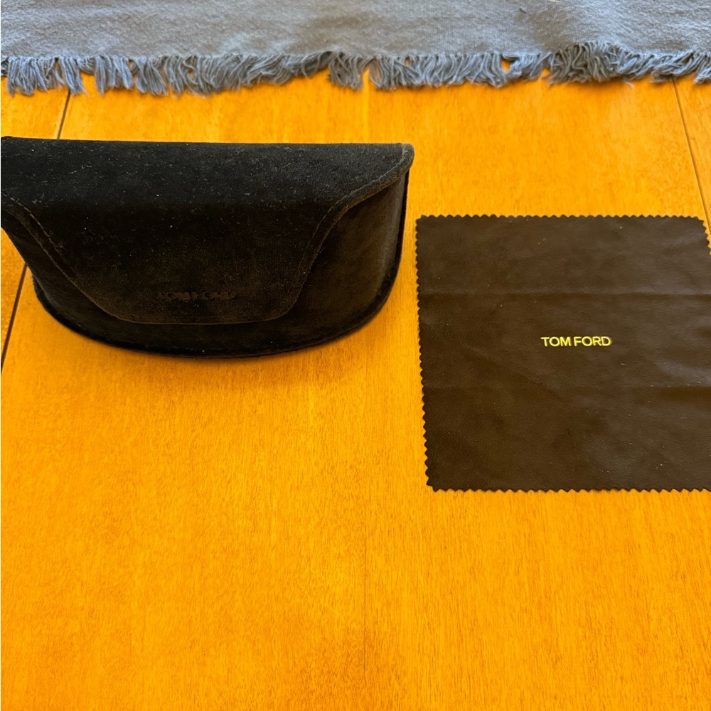 Black Tom Ford glasses case and cleaning cloth